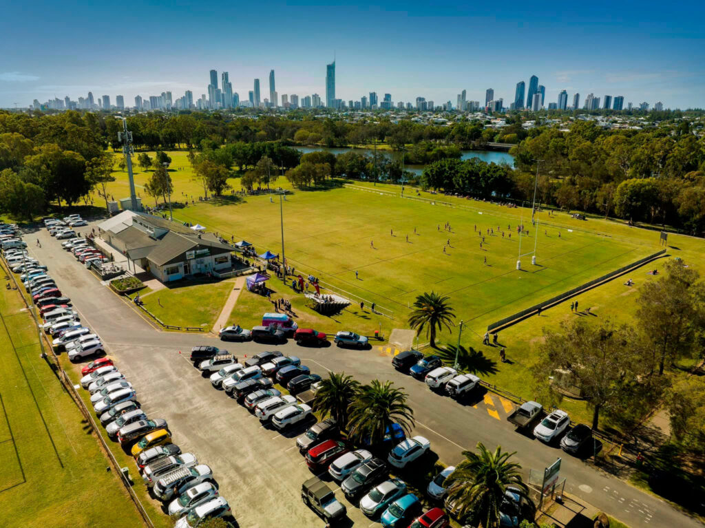 Drone image of Surfers Paradise Rugby Union Club and fields with Gold Coast skyline in the background
